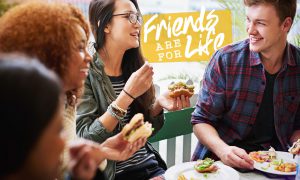 Friends Are For Life: Friends enjoying burgers at a fast food restaurant at the Tuscany community.
