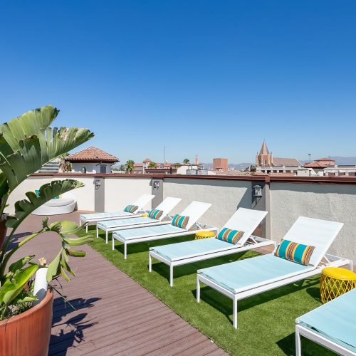 Rooftop sun deck with lounge chairs